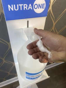 Hand sanitizer dispenser stand station